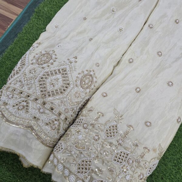 simmer tisu embrodery havy beats and lazar cutting work